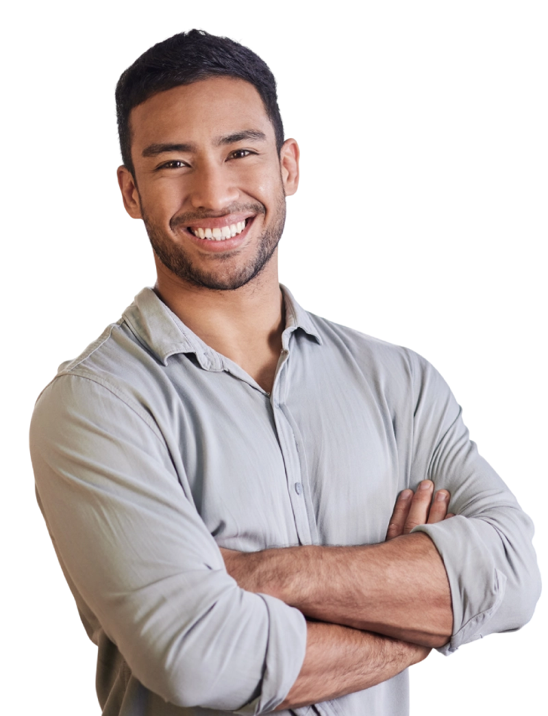 Smiling man in a light gray shirt with arms crossed.